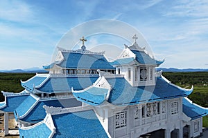 Aerial view of new Basilica of Our Lady of La Vang, 2 crosses in the rooftop