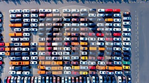 Aerial view new car lined up in the port for import and export business logistic to dealership for sale, Automobile and