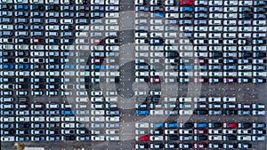 Aerial view new cars lined up in the port for import and export, Top view of new cars lined up outside an automobile factory for