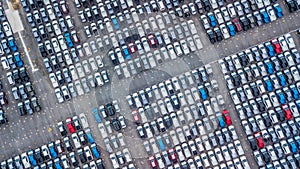 Aerial view new cars lined up in the port for import and export, Top view of new cars lined up outside an automobile factory for