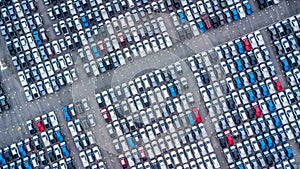 Aerial view new cars lined up in the port for import and export, Top view of new cars lined up outside an automobile factory for