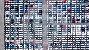 Aerial view new cars lined up in the port for import and export, Top view of new cars lined up outside an automobile factory for