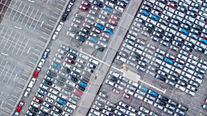 Aerial view new cars lined up in the port for import and export, Top view of new cars lined up outside an automobile factory for