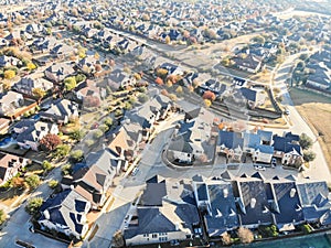 Aerial view new development park side residential neighborhood at morning fall light
