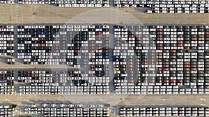 Aerial view new ev car on car park, Ev car loading, EV new cars stock at factory parking lot, Automotive industry, Logistics