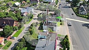 Aerial view of the new GSM antennas installed on the roof of a house in the city to transmit a 5g signal. Health risk