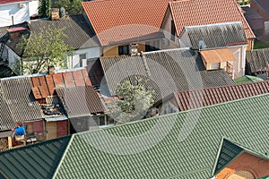 Aerial view of new and old house roofs