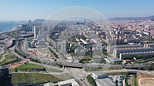 Aerial view of new residential complex of Diagonal Mar i el Front Maritim del Poblenou on sunny fall day, Barcelona