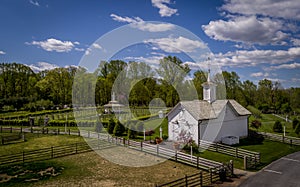 Aerial View of a New Vineyard and Gazebo With 2 Small Barns With Cupolas