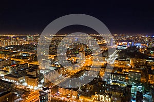 Aerial view of night modern city. Bright lights of the night streets. Ekaterinburg. Russia