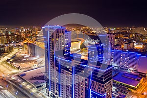 Aerial view of the night modern city. Bright lights of the night streets. Ekaterinburg. Russia