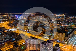 Aerial view of the night modern city. Bright lights of the night streets. Ekaterinburg. Russia