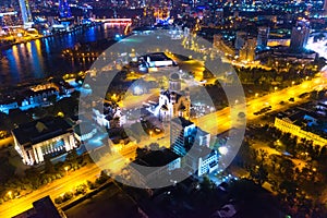 Aerial view of the night modern city. Church of Christ the Savior. Bright lights of the night streets. Ekaterinburg. Russia
