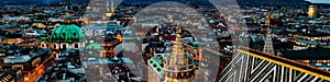 Aerial view of the night Vienna, Austria with illuminated buildings and Stephansdom cathedral