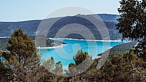 Aerial view of the Noguera Ribagorzana river with a cloudy blue sky in the background, Spain photo