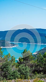 Aerial view of the Noguera Ribagorzana river with a cloudy blue sky in the background, Spain photo