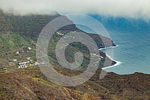 Aerial view of northeast of La Gomera Island. Beautiful rocky ocean coast with breaking waves. Playa de Hermigua, La Gomera,