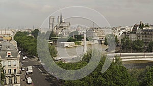 Aerial view of Notre Dame in Paris, Tournelle Bridge, statue of St. Genevieve