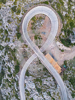 aerial view of the Nus de Sa Corbata hairpin turn in the Serra Tramuntan of Mallorca near Coll de Reis mountain pass photo