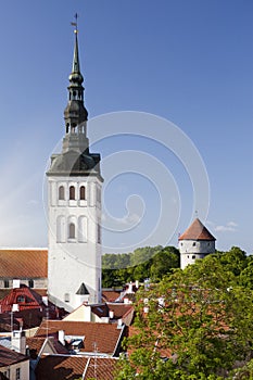 Aerial view on observation deck of Old city roofs and St. Nicholas Church Niguliste . Tallinn. Estonia