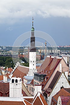 Aerial view on observation deck of Old city roofs and St. Nicholas Church Niguliste . Tallinn. Estonia