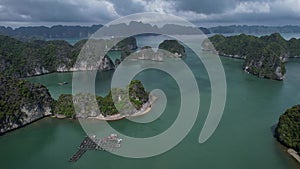 Aerial view of a ocean lake surrounded by islands in a natural landscape 5K view of Halong Bay Hanoi Vietnam