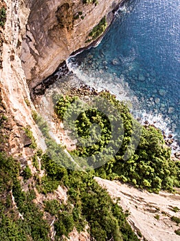 Aerial view on the ocean and rocks.