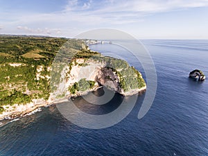 Aerial view on the ocean and rocks.