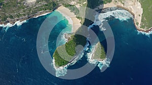 Aerial view of ocean and rocks at Kelingking Beach, Nusa Penida, Indonesia