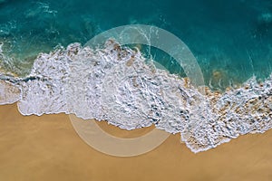 Aerial view of Ocean wave and Kelingking Beach in Nusa Penida island, Bali in Indonesia