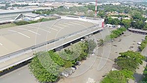 aerial view of office building and warehouse distribution center of retail based company at daytime