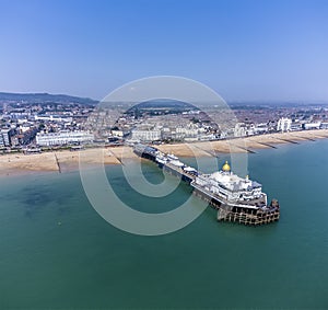 An aerial view from offshore towards the sea front and town at Eastbourne, UK
