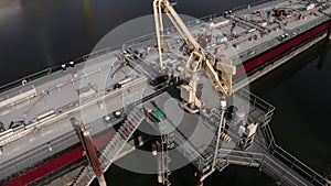 Aerial view of an oil cargo ship in a port, North Sea, Hamburg, Germany