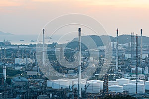 Aerial view of Oil and gas industry - refinery at sunset - factory - petrochemical plant, Shot from drone of Oil refinery and