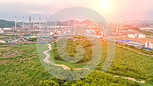 Aerial view Oil refinery.Industrial view at oil refinery plant form industry zone with sunrise and cloudy sky.Oil refinery and