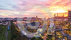 Aerial view Oil refinery.Industrial view at oil refinery plant form industry zone with sunrise and cloudy sky.Oil refinery and