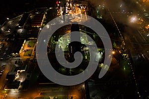 Aerial view of oil refinery. Plant with lots of light at night.