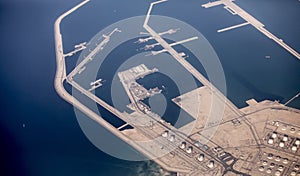 Aerial view of oil refinery and tankers loading along the coast of Qatar photo