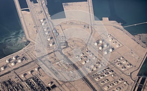 Aerial view of oil storage and shipping facilities along the coast of Qatar at Ras Laffin