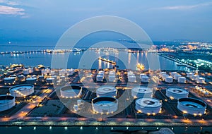 Aerial view oil storage tank with oil refinery factory industrial. Oil refinery plant at night. industry factory concept and