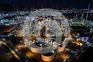 Aerial view oil storage tank with oil refinery factory industrial. Oil refinery plant at night. industry factory concept and