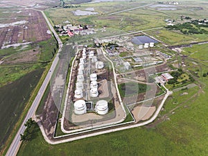 Aerial view of oil storage tanks. Industrial facility for the st