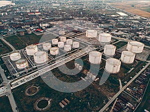 Aerial view of Oil Storage Tanks or Reservoirs. Oil refinery industry, petroleum and petrochemical plant