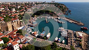 Aerial view of Old Antalya Marina and Kaleici in Antalya, Turkey. Drone flying over the marina. The Kaleici area is the