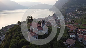 Aerial view of an old church overlooking the lake Iseo