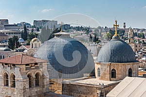 Aerial view of the old city with blue sky of Jerusalem. Christian quarter and dome of  the Church of the Holy Sepulchre. View from