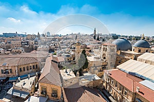 Aerial view of the old city with blue sky of Jerusalem. Muristan street in Christian quarter and dome of  the Church of the Holy