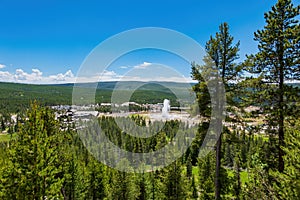 Aerial view of the Old Faithful geyser hot water eruptions