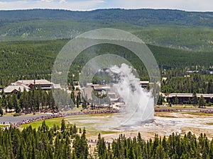 Aerial view of the Old Faithful geyser hot water eruptions