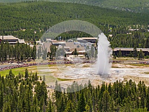 Aerial view of the Old Faithful geyser hot water eruptions